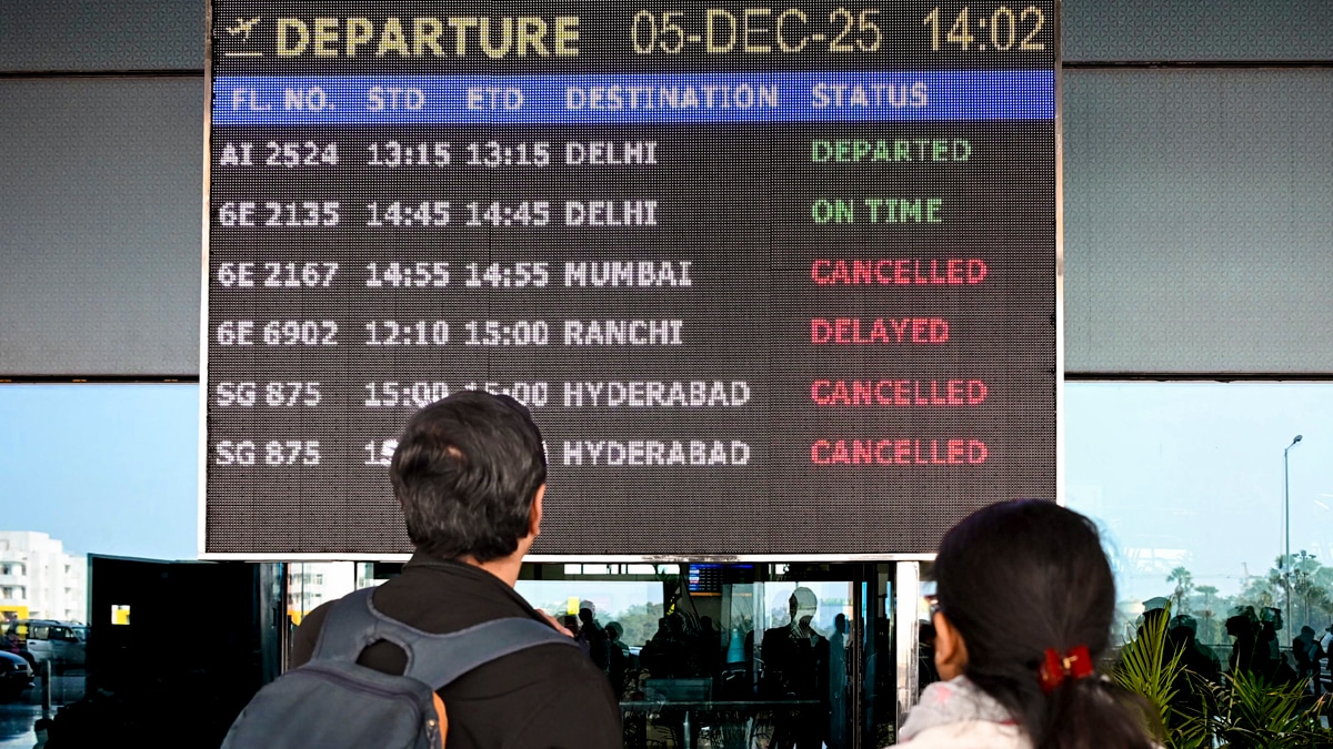 Patna: Passengers look at the display board for information amid IndiGo flight disruptions, at Jay Prakash Narayan International Airport, in Patna, Friday, Dec. 5, 2025. (PTI Photo)(PTI12_05_2025_000352A)