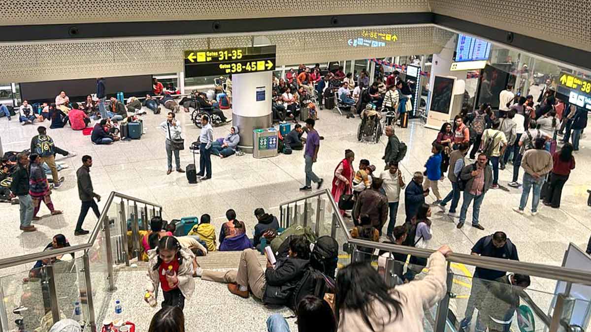 Stranded passengers at Indira Gandhi International Airport, in New Delhi | PTI