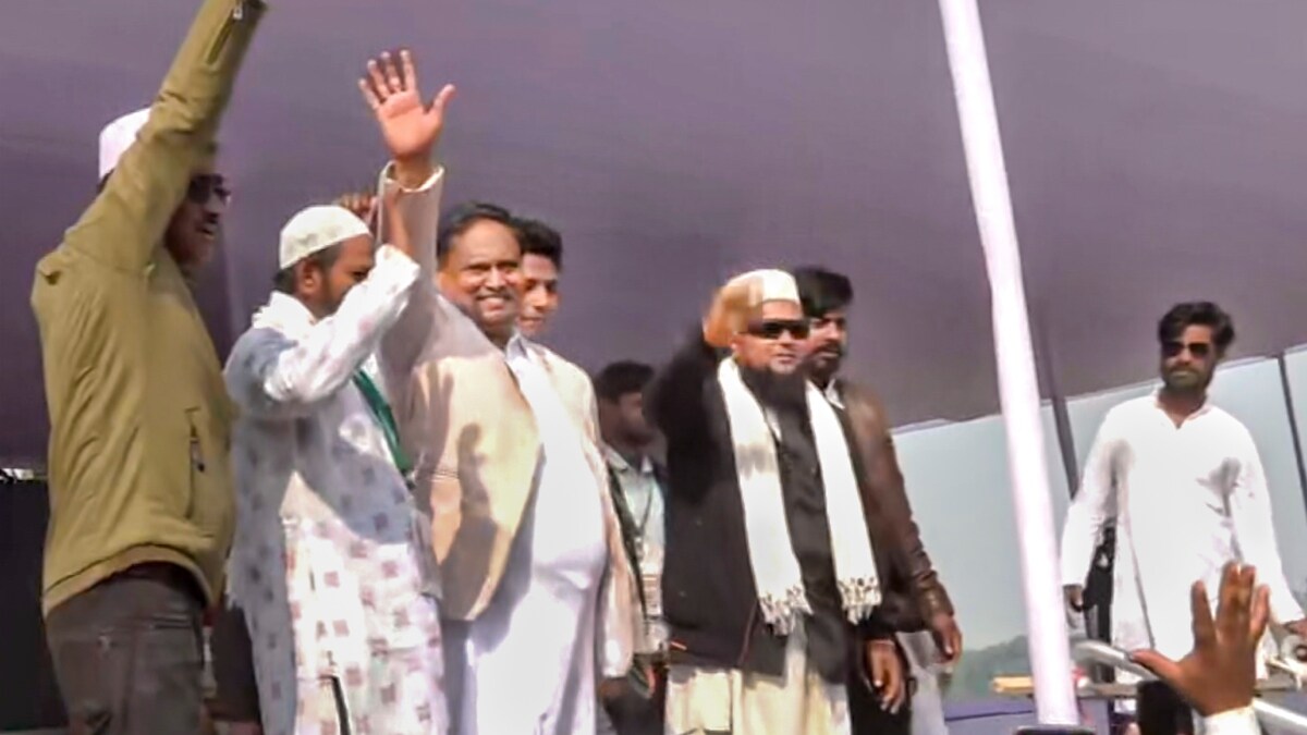 Former TMC MLA Humayun Kabir (third from left) waves to the gathering, in Murshidabad | PTI