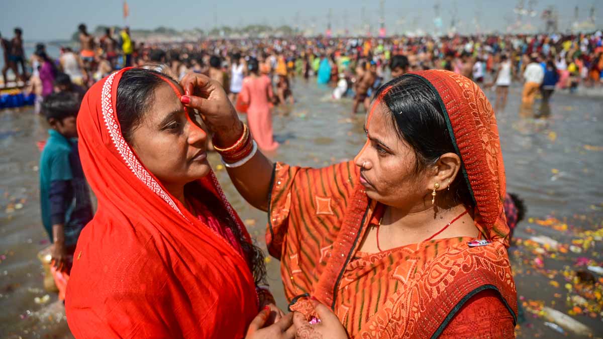 Devotees perform rituals at the Sangam during the ongoing Mahakumbh Mela 2025, in Prayagraj | PTI