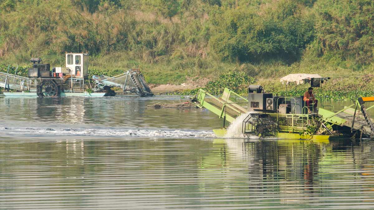 Cleaning work underway at the Yamuna river, in New Delhi | PTI