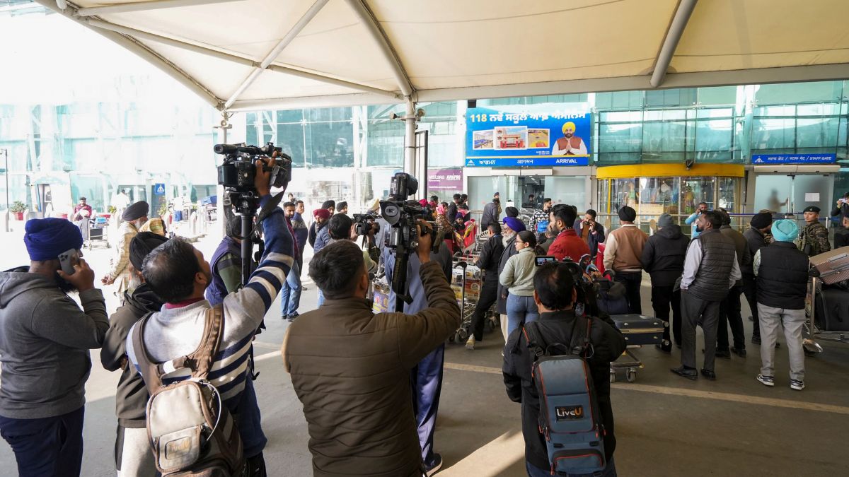 Mediapersons wait outside Shri Guru Ramdas Ji International Airport in Amritsar on February 5, 2025 | PTI