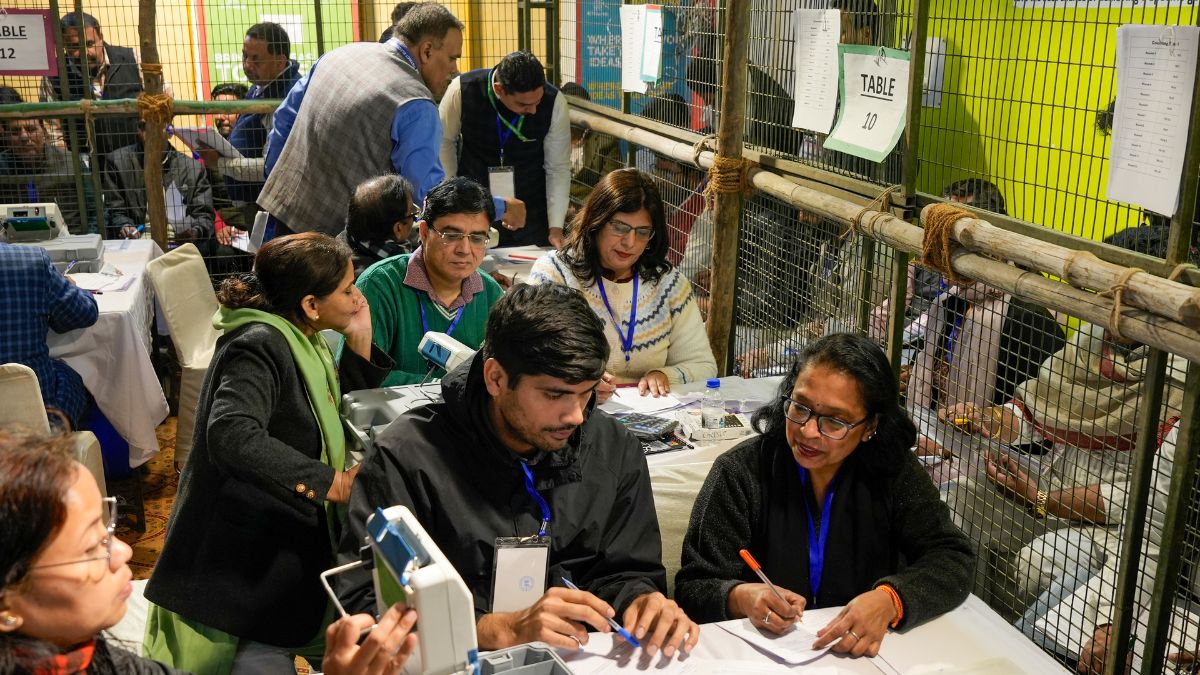Poll officials count votes for Delhi Assembly polls at the Gole Market counting centre | PTI