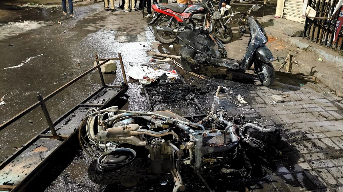  Charred remains of two-wheelers lie on a roadside in the aftermath of a violence that erupted on Monday, in Nagpur | PTI 