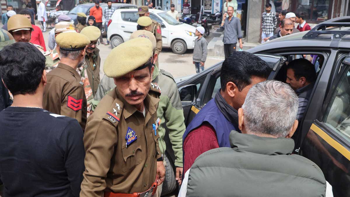 NIA officials leave after conducting searches at a house, in Jammu | PTI