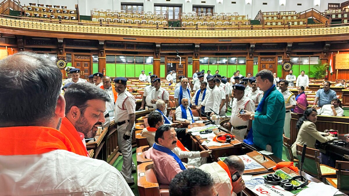 Bengaluru: BJP MLAs being evicted by Marshals during the Budget session of the Assembly, in Bengaluru, Friday, March 21, 2025. Eighteen BJP MLAs were suspended for six months from the Legislative Assembly on Friday for "disrespecting" Speaker U T Khader. (PTI Photo) (PTI03_21_2025_000330B)