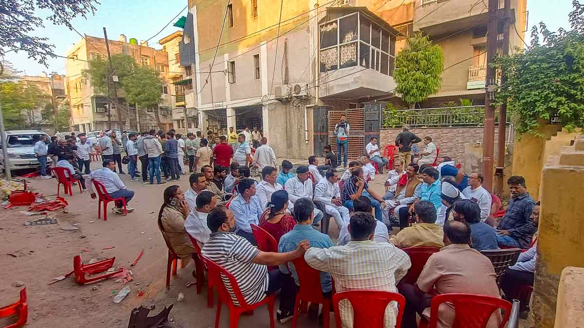 Locals outside Samajwadi Party MP Ramji Lal Suman's residence after it was attacked allegedly by Karni Sena workers, in Agra | PTI