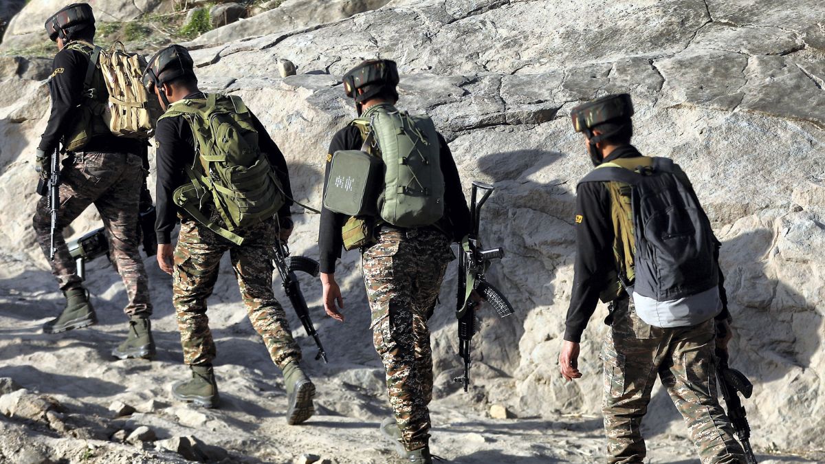 Security personnel patrol a remote forested area in Kathua district, Jammu and Kashmir | PTI