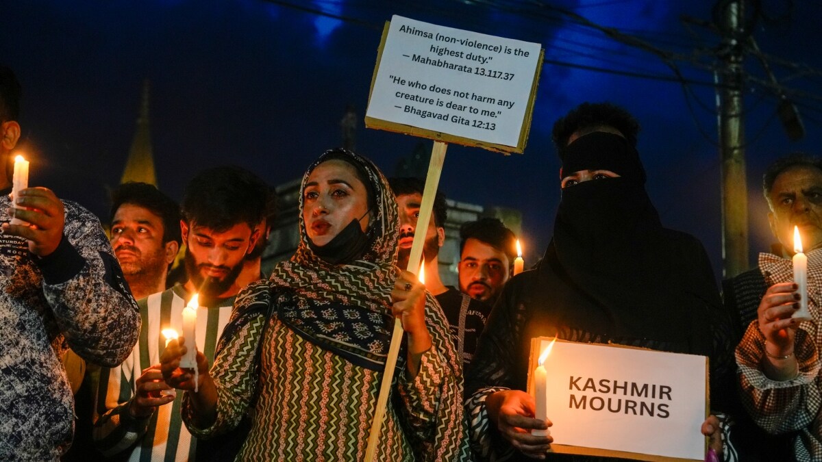 People hold a candlelight vigil to pay tribute to the victims of the Pahalgam terror attack, outside Jamia Masjid Nowhatta in downtown Srinagar | PTI 