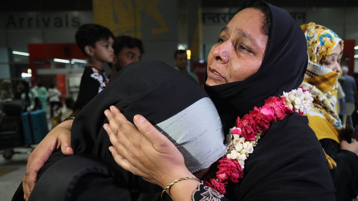 New Delhi: An Indian student returning from Mashhad, Iran, as part of the government's Operation Sindhu, reacts after meeting her relative at the Indira Gandhi International Airport, in New Delhi, Saturday, June 21, 2025. A flight from Mashhad, Iran, carrying 290 Indian students, mostly from Jammu and Kashmir, landed at the Delhi Airport late Friday. (PTI Photo)(PTI06_21_2025_000015A)