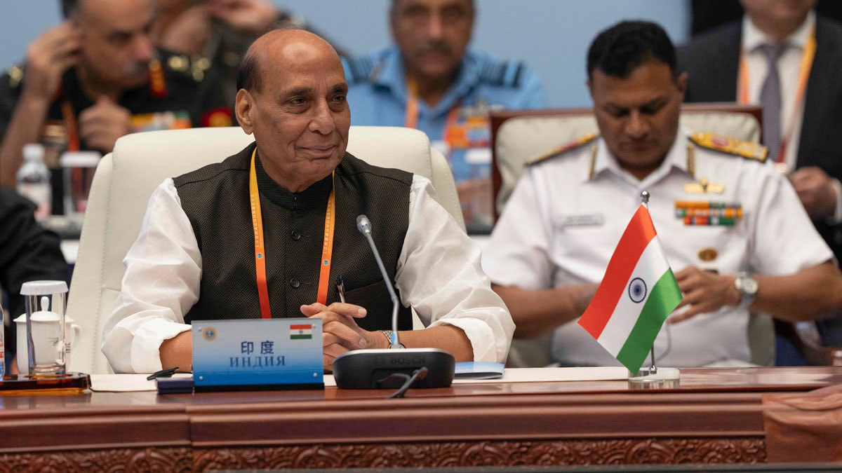 India's Defence Minister Rajnath Singh, left, attends the Defense Ministers' Meeting of the Shanghai Cooperation Organization Members States in Qingdao in eastern China's Shandong province on Thursday, June 26, 2025. AP/PTI(AP06_26_2025_000007B)
