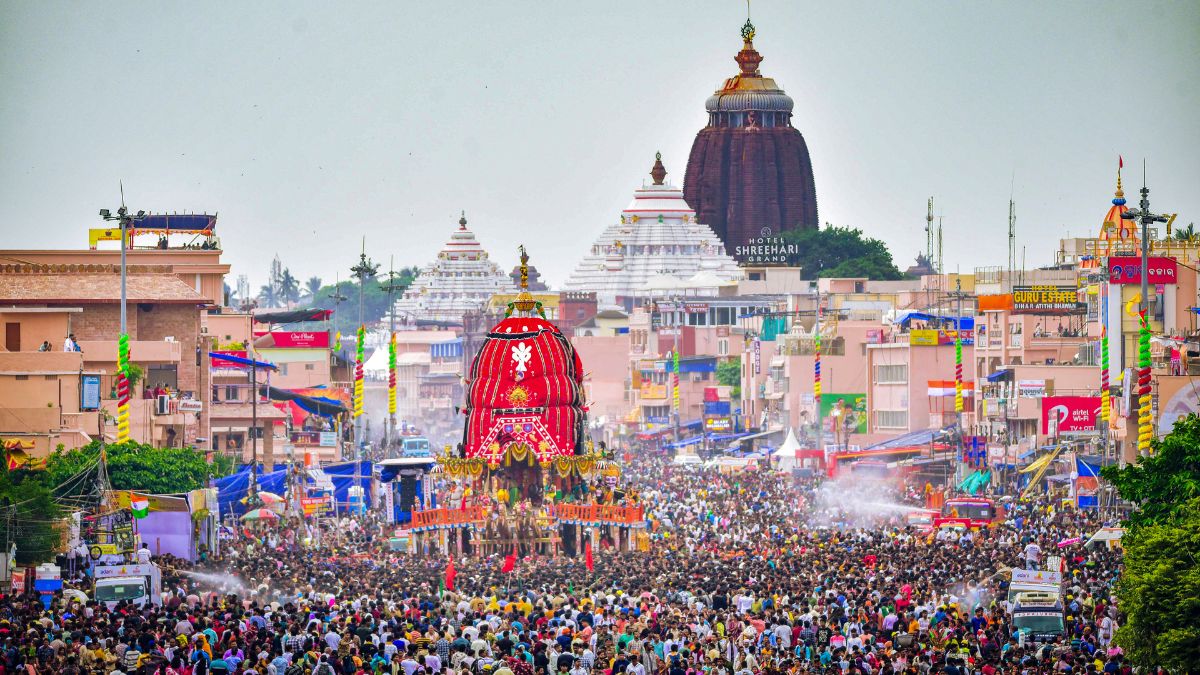 People pull the chariot of Lord Jagannath during the annual Rath Yatra festival, in Puri, Odisha | PTI