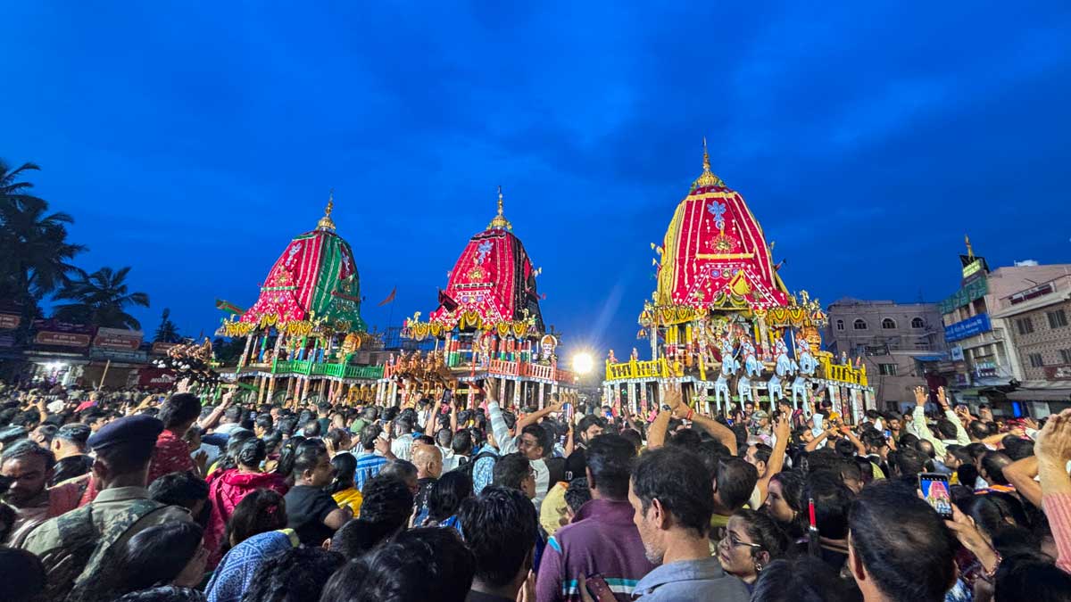 People gather near the chariots of Lord Jagannath, Lord Balabhadra and Goddess Subhadra during the annual 'Rath Yatra' festival celebration, in Puri | PTI