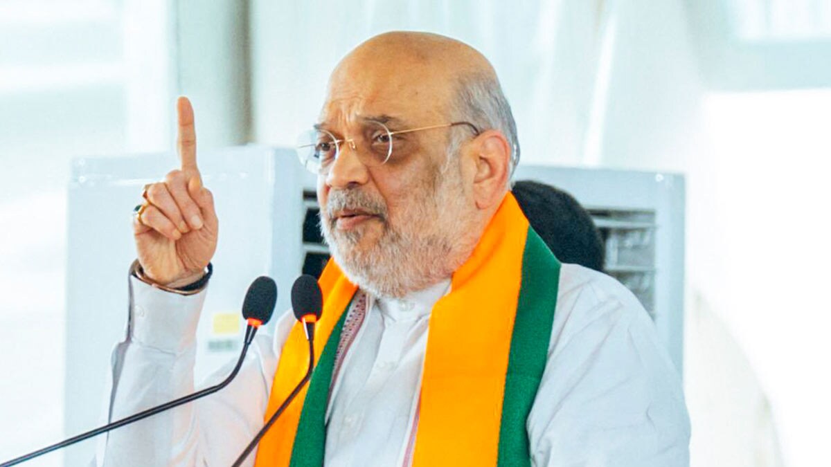 Union Home Minister and BJP leader Amit Shah addresses Tamil Nadu's party office bearers during a meeting, in Madurai | PTI