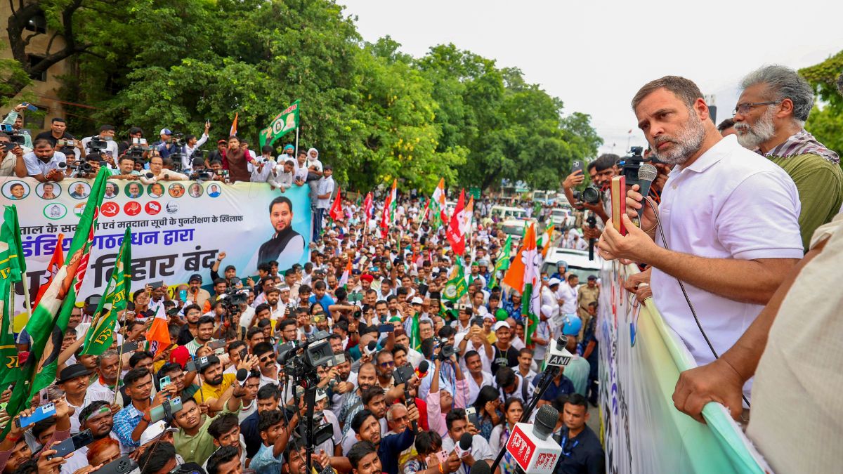 Congress leader Rahul Gandhi with CPI (ML) Liberation General Secretary Dipankar Bhattacharya and others addresses supporters and the media during 'Bihar bandh' called by the INDIA bloc against Special Intensive Revision in the state, in Patna | PTI 