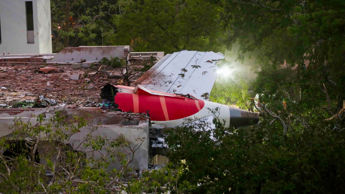 **EDS: FILE IMAGE** Ahmedabad: In this Thursday, June 12, 2025 file photo, wreckage of the Air India plane that crashed moments after taking off from the Ahmedabad airport, lies on a building, in Ahmedabad. Both switches feeding fuel to the two engines of Air India flight 171 were cut off followed by pilot confusion before the plane crashed in Ahmedabad, seconds after taking off, the first investigation report into the crash has revealed. (PTI Photo) (PTI07_12_2025_000001B)