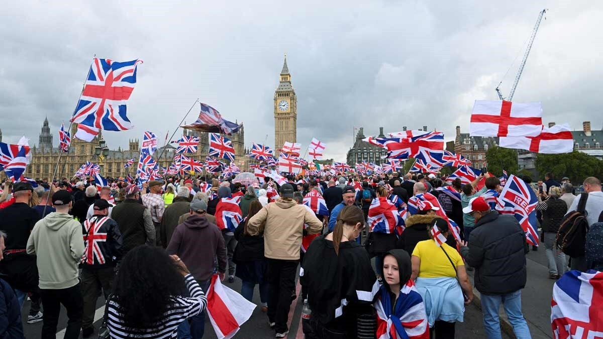 People demonstrate during the Tommy Robinson-led Unite the Kingdom march and rally in London | AP