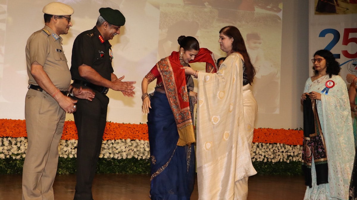 (From left) BRO Lt General DG Raghu Srinivasan, Bollywood actress Nimrit kaur and BROWWA President Sumita Srinivasan