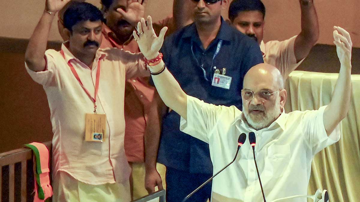 Thiruvananthapuram: Union Home Minister Amit Shah addresses the gathering during a meeting with the newly elected BJP representatives of local bodies, in Thiruvananthapuram, Sunday, Jan. 11, 2026. (PTI Photo) (PTI01_11_2026_000280B)