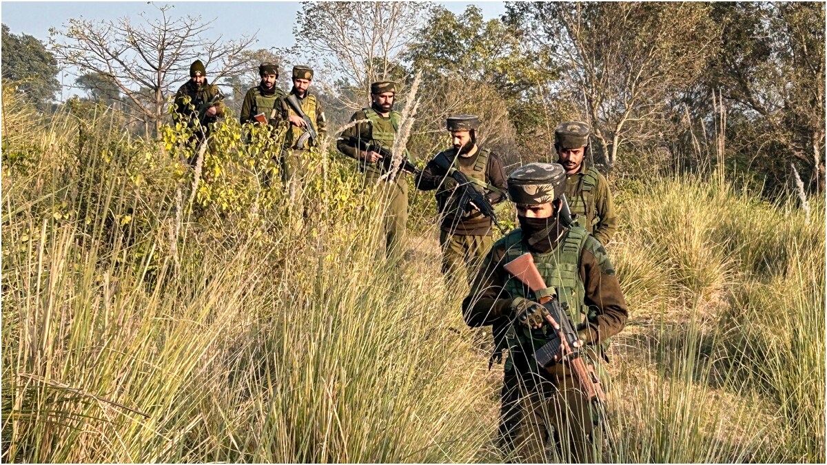 Security personnel of the Special Operations Group (SOG) keep a vigil along the Babbar Nallah near the International Border in Samba district of Jammu and Kashmir | PTI