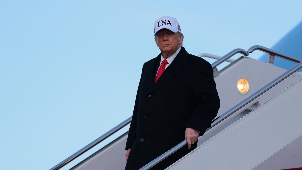 US President Donald Trump disembarks Air Force One, on his return from Detroit, Michigan, at Joint Base Andrews, Maryland | Reuters