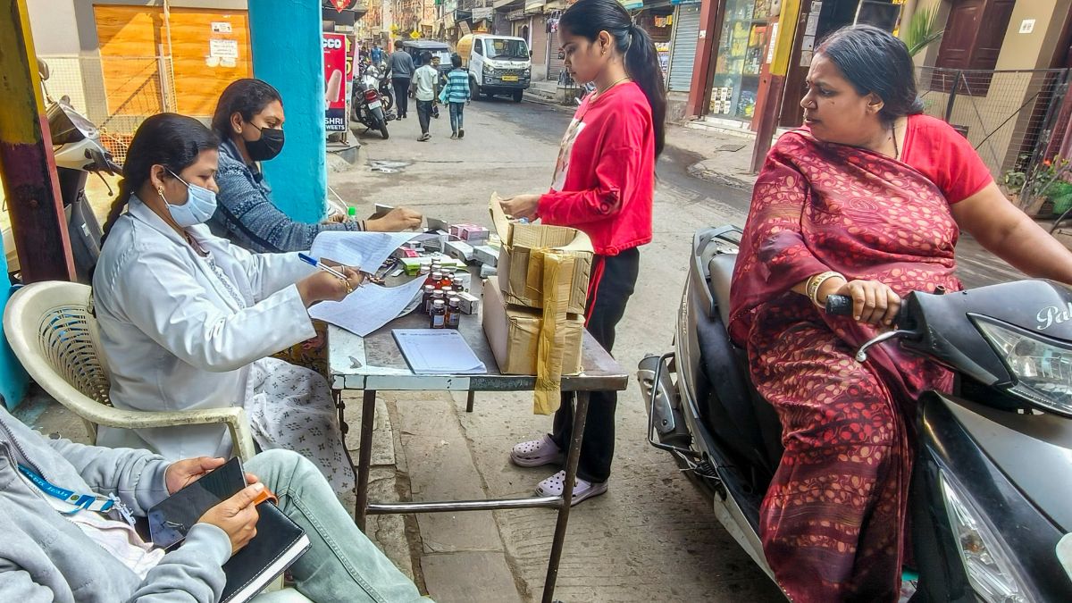  Medicines being distributed at a camp after several people were affected due to consumption of contaminated water at Bhagirathpura area, in Indore | PTI 