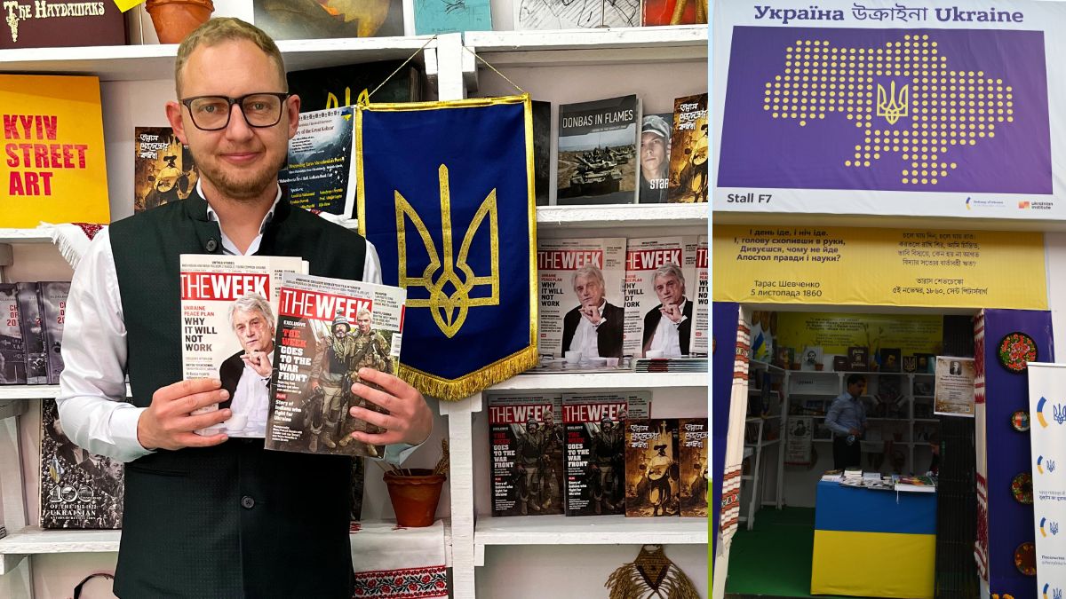 Volodymyr Prytula (L), Second Secretary, Embassy of Ukraine, holds up two issues of THE WEEK that discuss the Russia-Ukraine war, at the Ukraine stall (R) of the 49th International Kolkata Book Fair | Prema Rajaram, Salil Bera