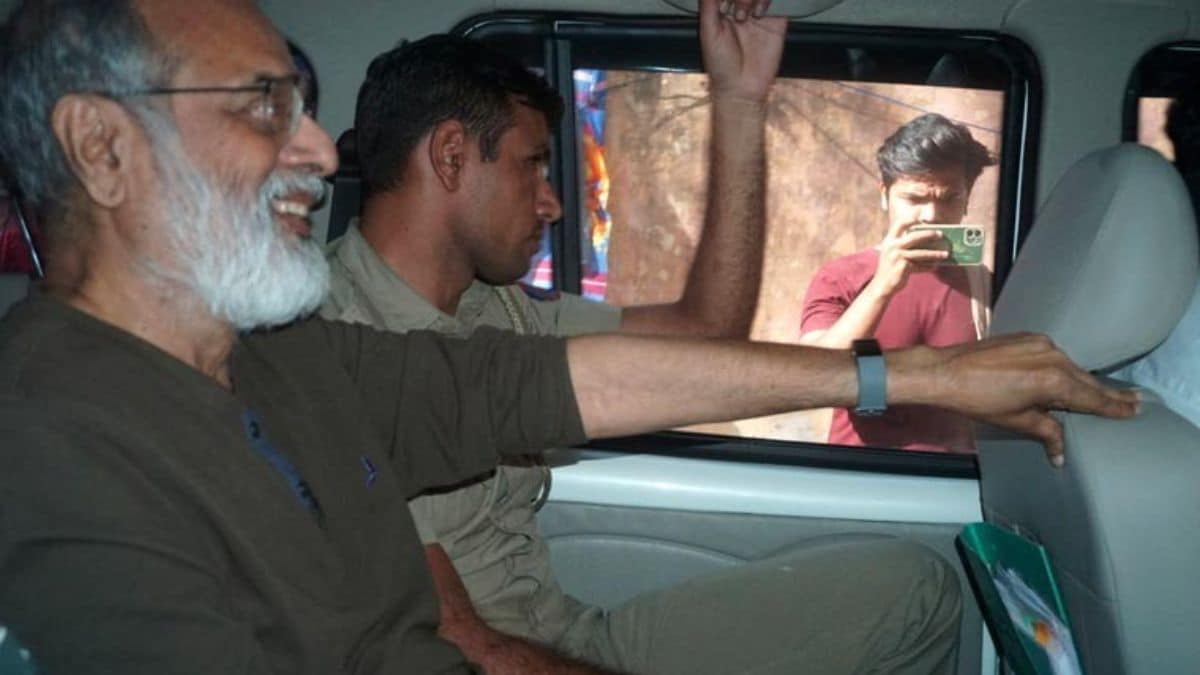 [File] NewsClick founder and Editor-in-Chief Prabir Purkayastha (extreme left) | AP