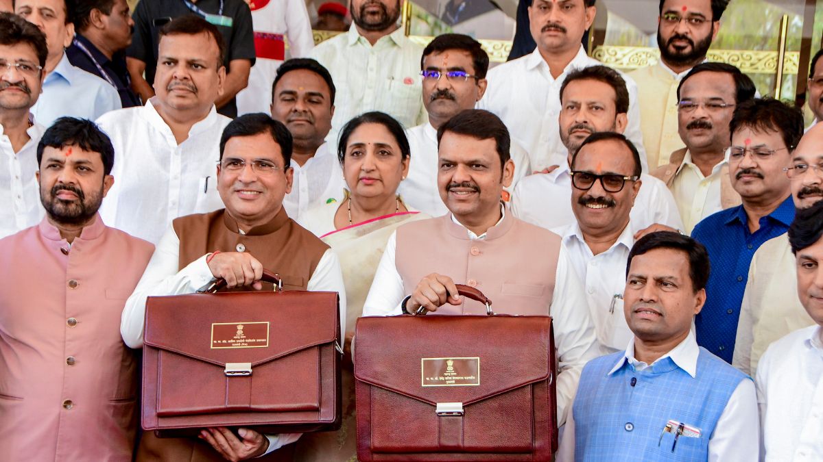Maharashtra Chief Minister and state Finance Minister Devendra Fadnavis, MoS for Finance Ashish Jaiswal, Deputy Chief Minister Sunetra Pawar and other MLAs arrive at the Assembly before the presentation of the state budget, in Mumbai | PTI 