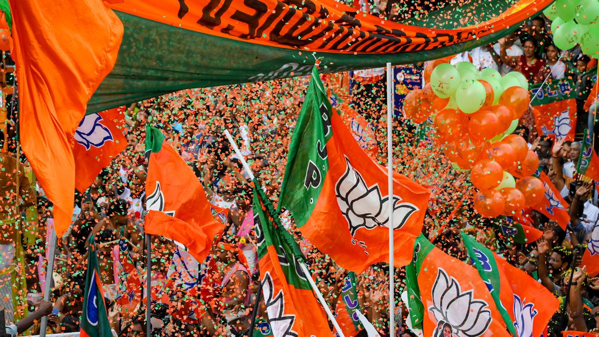 BJP supporters gather on the final day of open campaigning for the Kerala Assembly elections, at Peroorkada, in Thiruvananthapuram | PTI