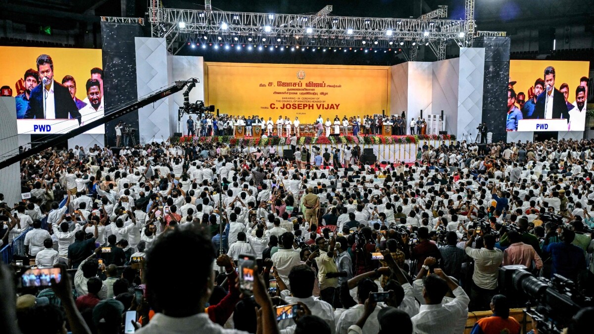 Supporters of the Tamilaga Vettri Kazhagam (TVK) party attend the swearing-in ceremony of the newly elected government | AFP