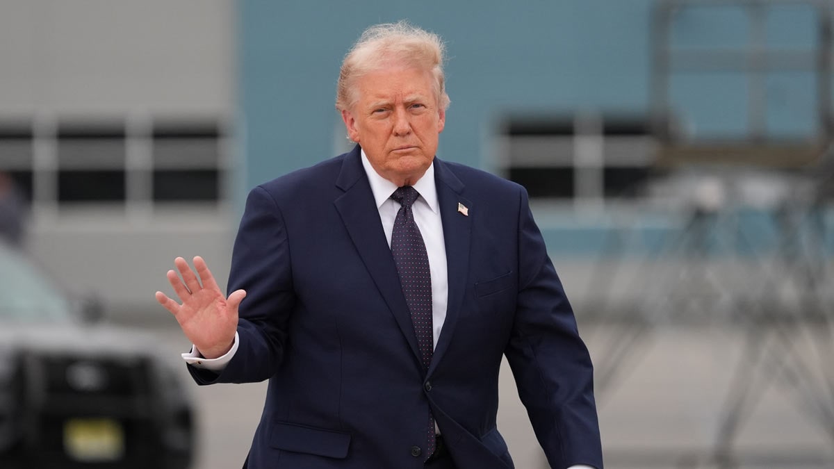 President Donald Trump walks from Marine One to board Air Force One at Morristown Airport | AP