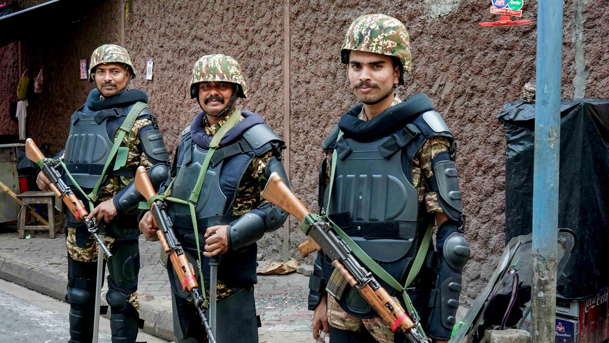 Security personnel stand guard outside the counting centre at Bhabanipur constituency | PTI