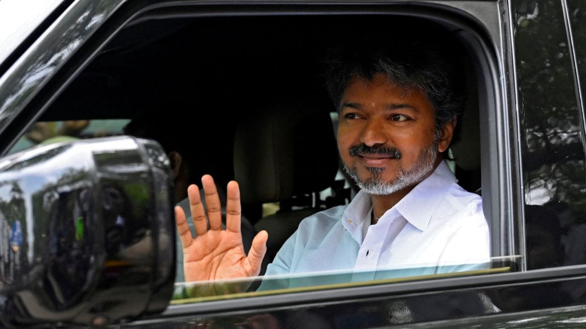 Actor-turned-politician Vijay, president of Tamilaga Vettri Kazhagam (TVK), waves as he arrives at his party’s office | PTI