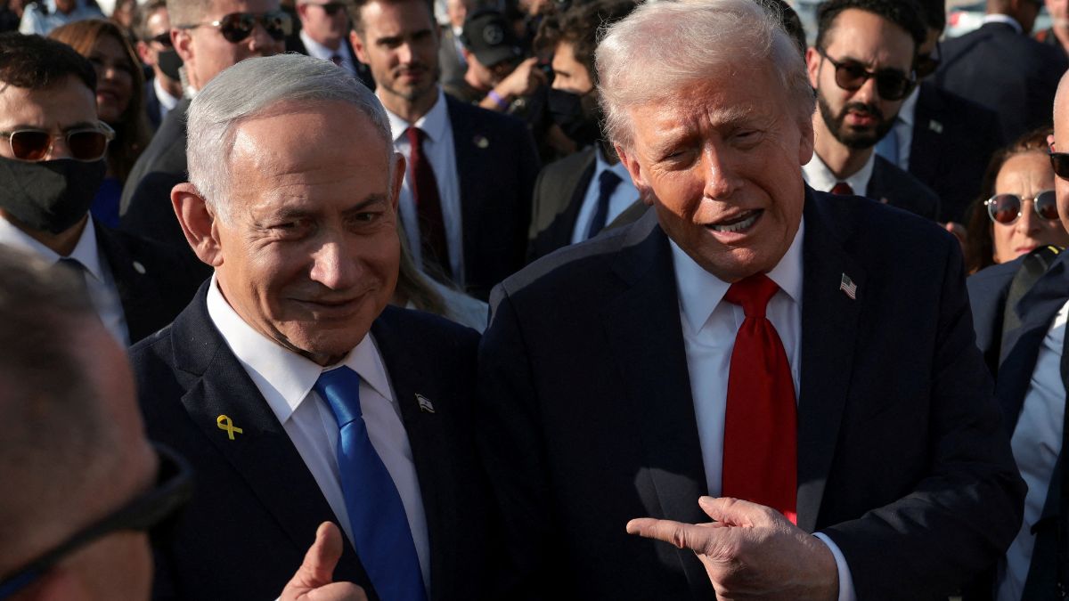 : U.S. President Donald Trump gestures next to Israeli Prime Minister Benjamin Netanyahu at Ben Gurion International Airport as Trump leaves Israel en route to Sharm El-Sheikh, Egypt | Reuters 