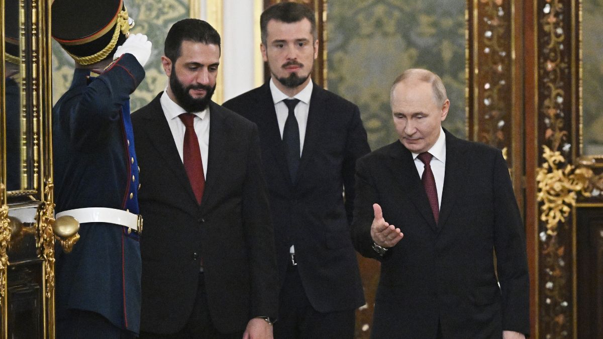 Russian President Vladimir Putin, left, welcomes Syrian interim President Ahmad al-Sharaa, left, for talks during their meeting at the Grand Kremlin Palace in Moscow, Russia, Wednesday | AP