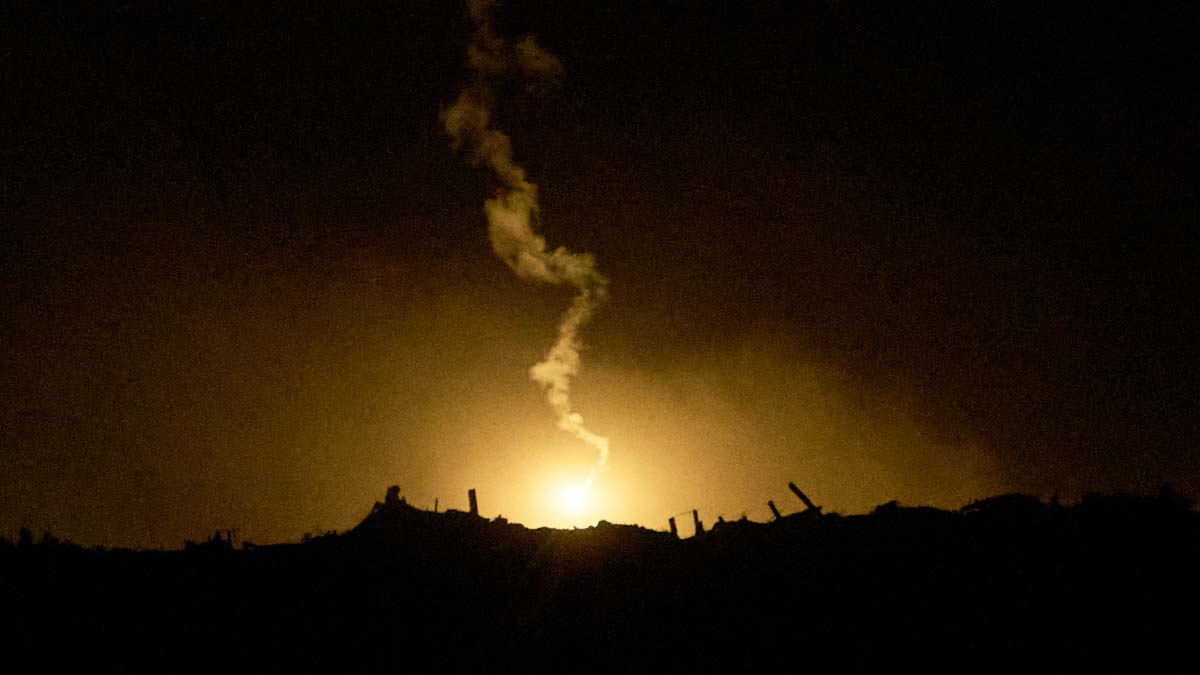 An Israeli army flare drifts over an area in the northern Gaza Strip, as seen from southern Israel | AP