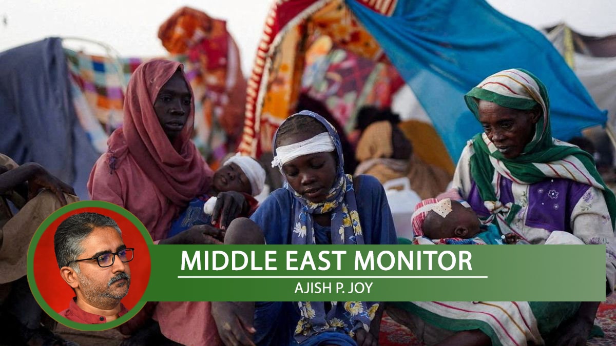 Ikram Abdelhameed looks on next to her family while sitting at a camp for displaced people who fled from al-Fashir to Tawila, North Darfur, Sudan | Reuters 