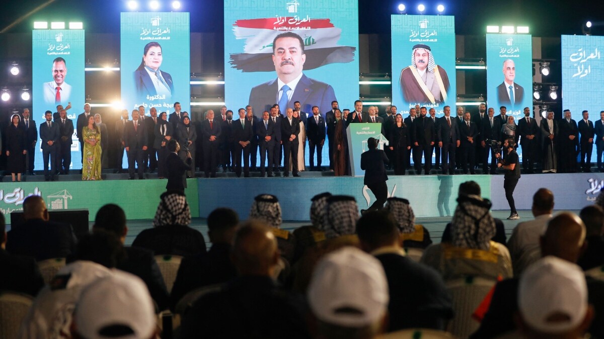 Iraq's Prime Minister Mohammed Shia al-Sudani (C), delivers a speech during a campaign rally for the Reconstruction and Development Coalition ahead of the country's parliamentary elections | AFP

