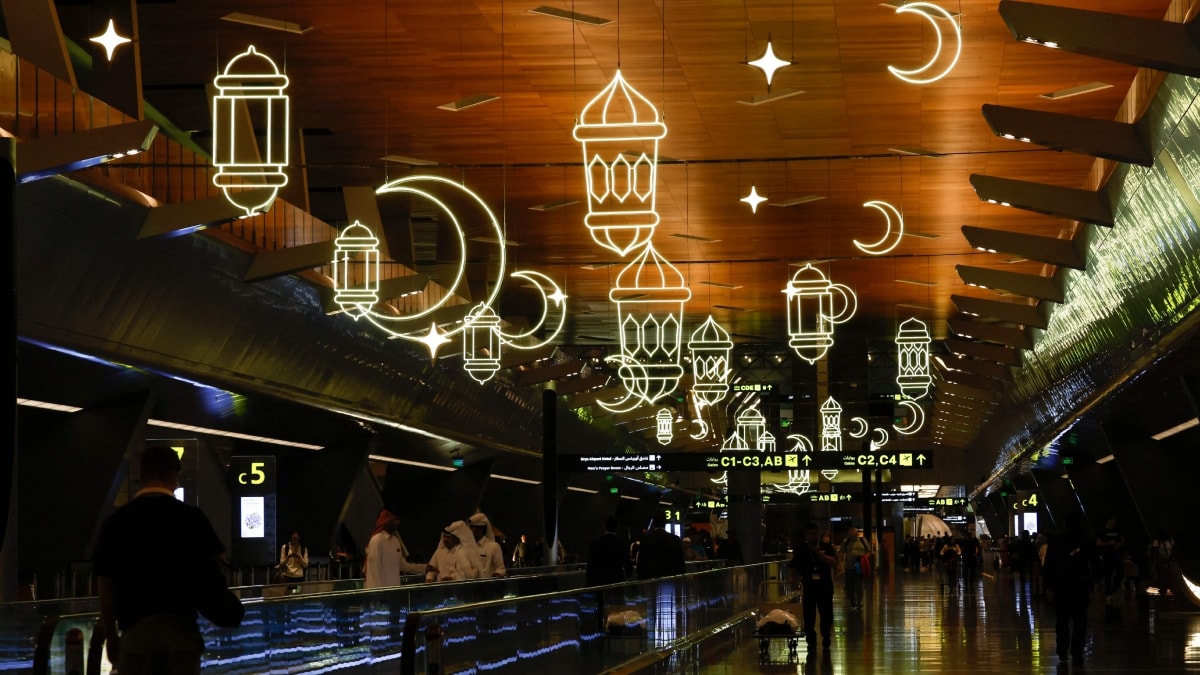 Luminous lanterns and crescents are hung as Ramadan decorations at Hamad International Airport in Doha | AFP