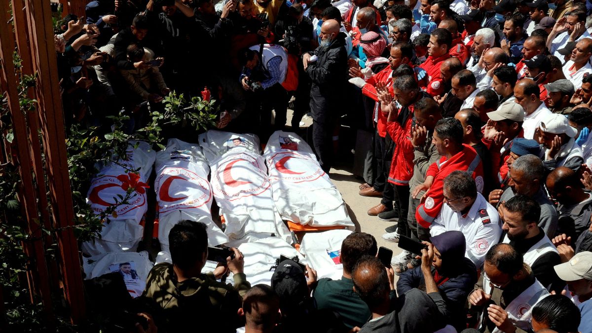 Palestinians mourn medics, who came under Israeli fire while on a rescue mission, after their bodies were recovered, according to the Red Crescent, at Nasser hospital in Khan Younis in the southern Gaza Strip | Reuters