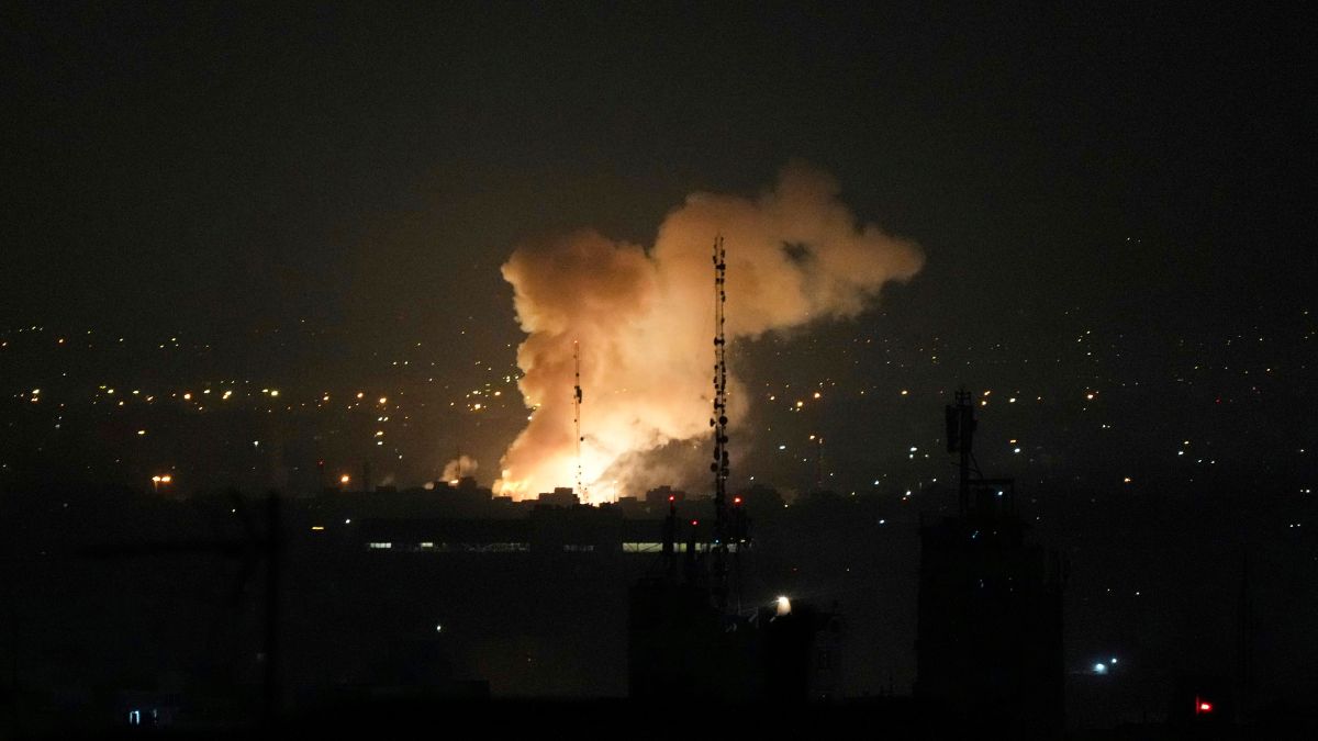 Smoke rises up after an explosion in Tehran | AP