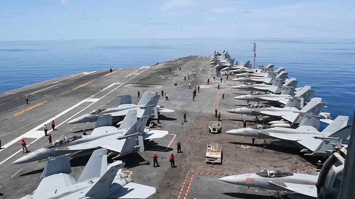 [File] Aircraft carrier USS Nimitz (CVN 68) conducting flight operations in the South China Sea | AFP