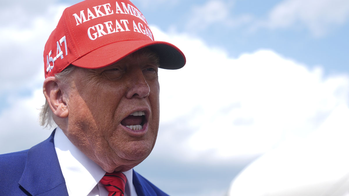 President Donald Trump speaks with reporters upon arriving at Morristown Municipal Airport in Morristown, N.J., Friday, June 20, 2025. (AP Photo/Manuel Balce Ceneta)