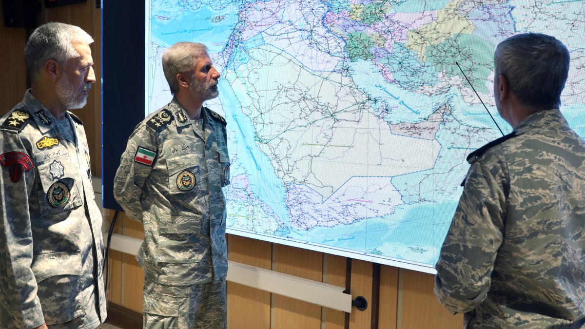 Iran's army commander-in-chief Gen. Amir Hatami (C) Admiral Mahmoud Mousavi (R) and Admiral Habibollah Sayyari attend a meeting in Zolfaghar central headquarters. | PTI
