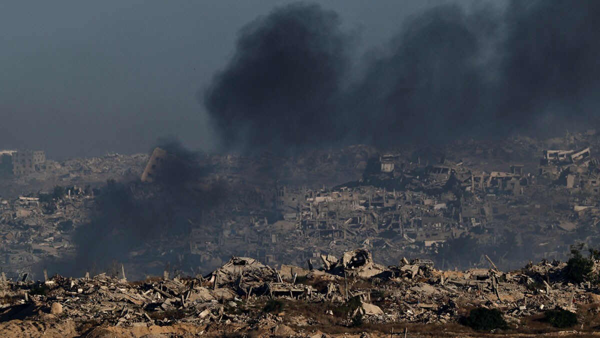 Smoke rises in Gaza following an explosion, as seen from the Israeli side of the border, July 6, 2025. REUTERS/Amir Cohen