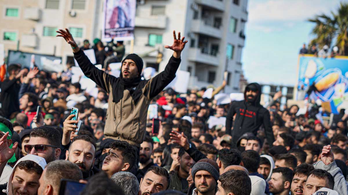 Protesters from the Alawite religious minority demonstrate in Latakia two days after a bomb in an Alawite mosque in Homs killed eight people and wounded 18 during Friday prayers  | AP