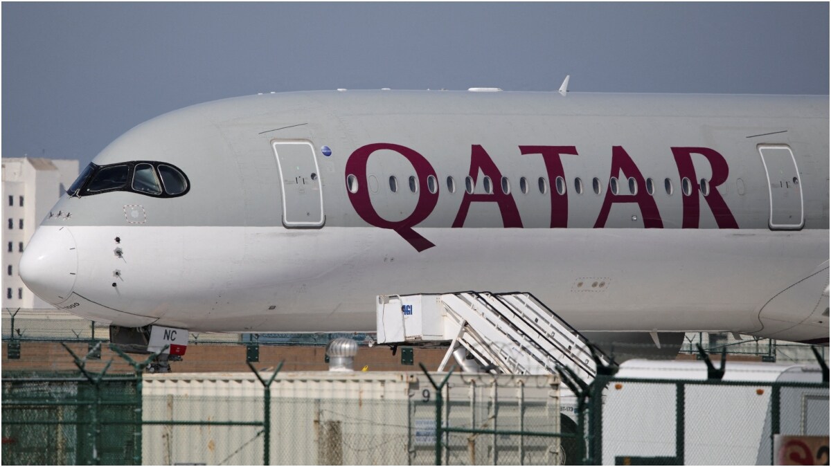 A Qatar Airways plane sits on the tarmac | Reuters