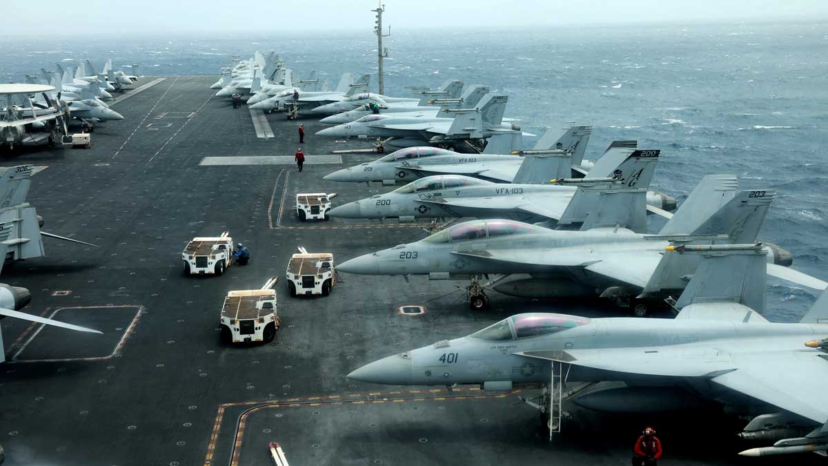 [File] F/A-18F aircrafts are seen on the deck of USS Abraham Lincoln in the Gulf of Oman near the Strait of Hormuz | Reuters