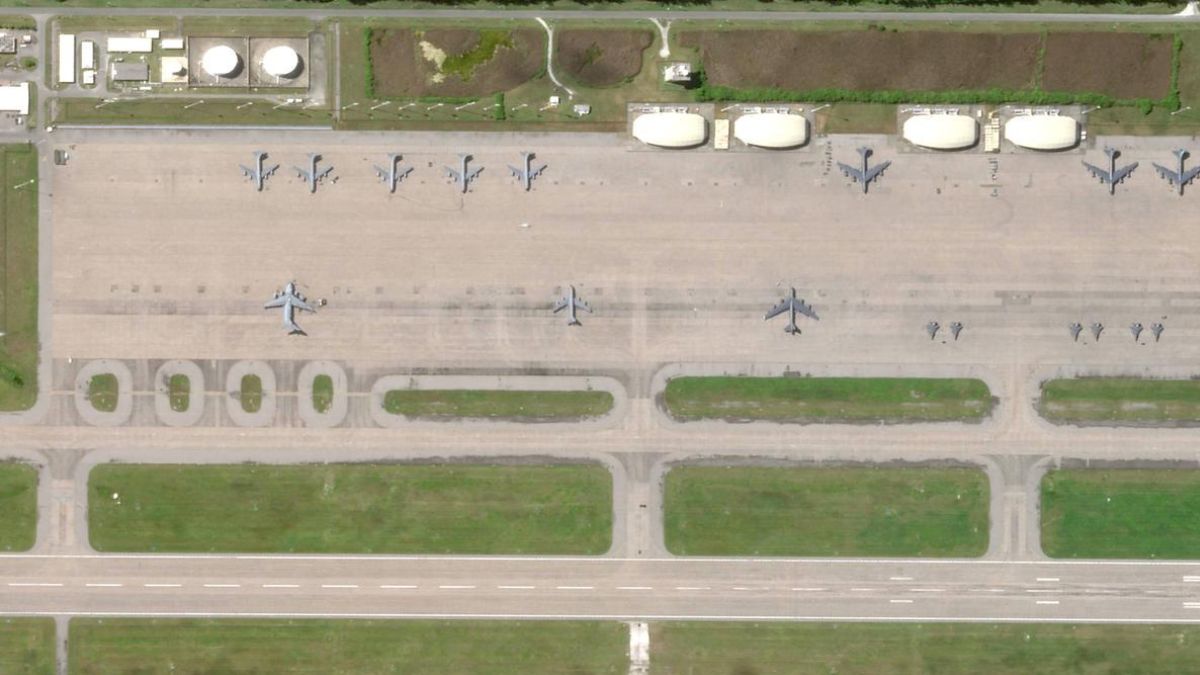 This handout satellite photo obtained from Planet Labs PBC shows an overview of the Diego Garcia military base on the Chagos Archipelago in the Indian Ocean | AFP
